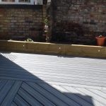 Planters alongside composite decking